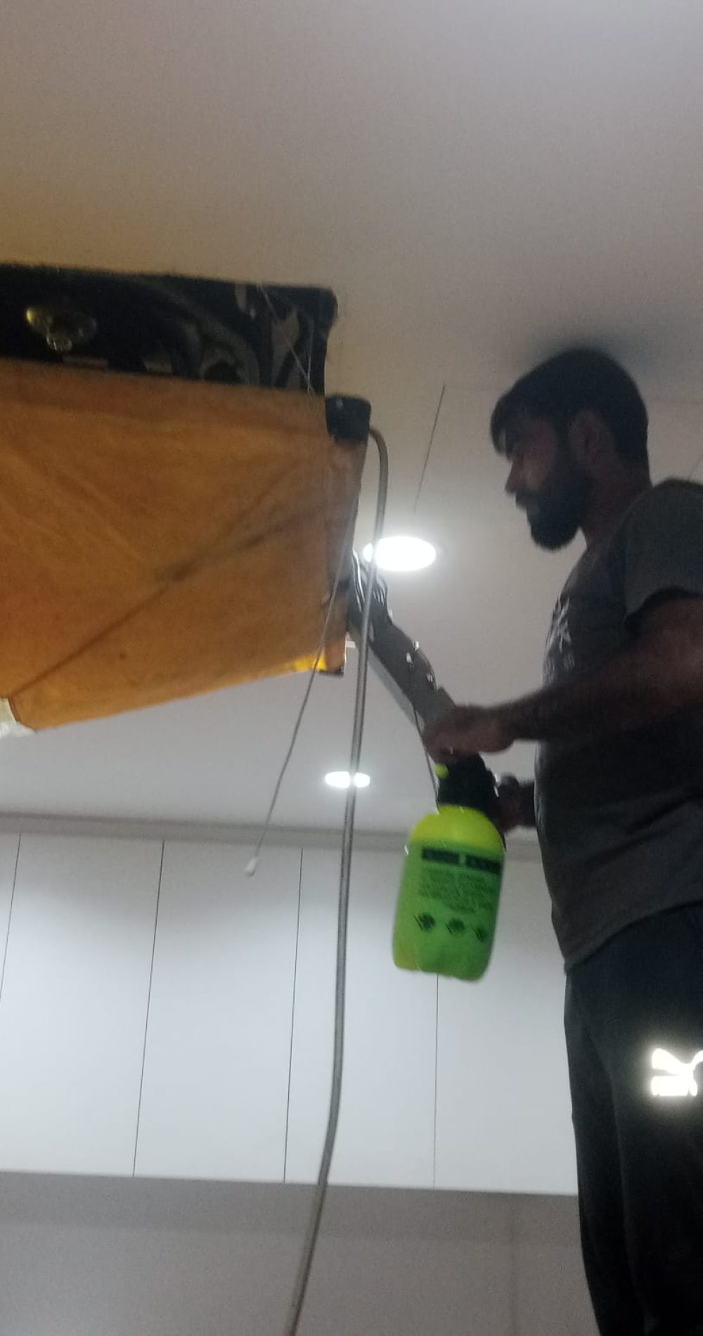 Professional technician dismantling indoor unit for aircond chemical wash service KL & Seri Kembangan